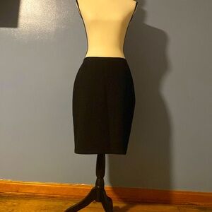Mark Wong Nark, midi black skirt.